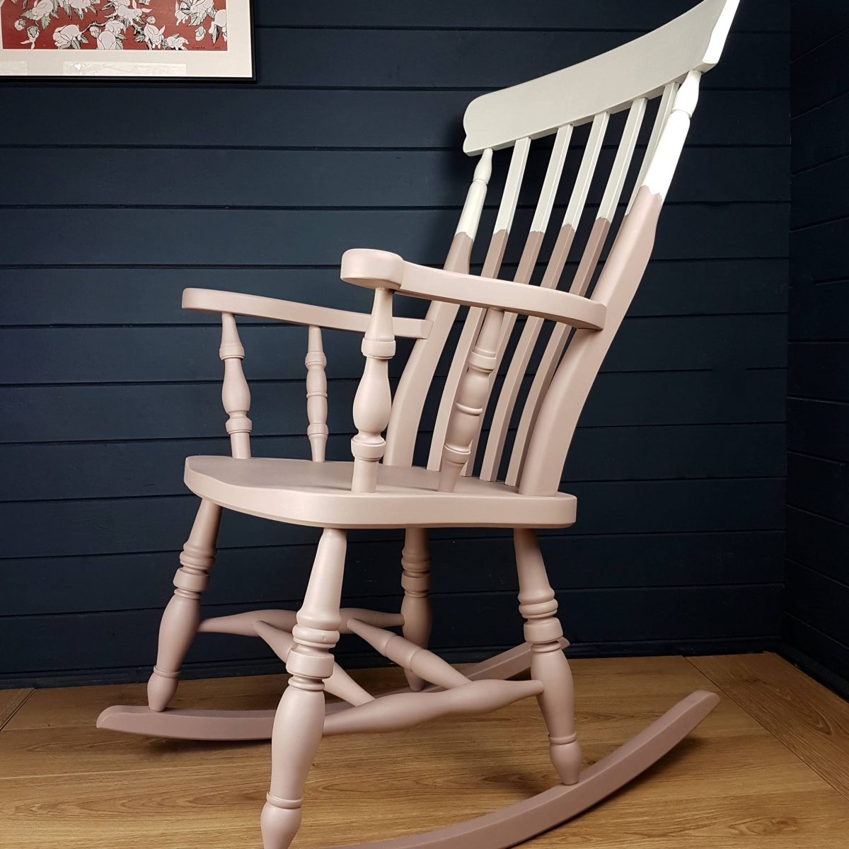 Two-tone pink and white painted wooden rocking chair