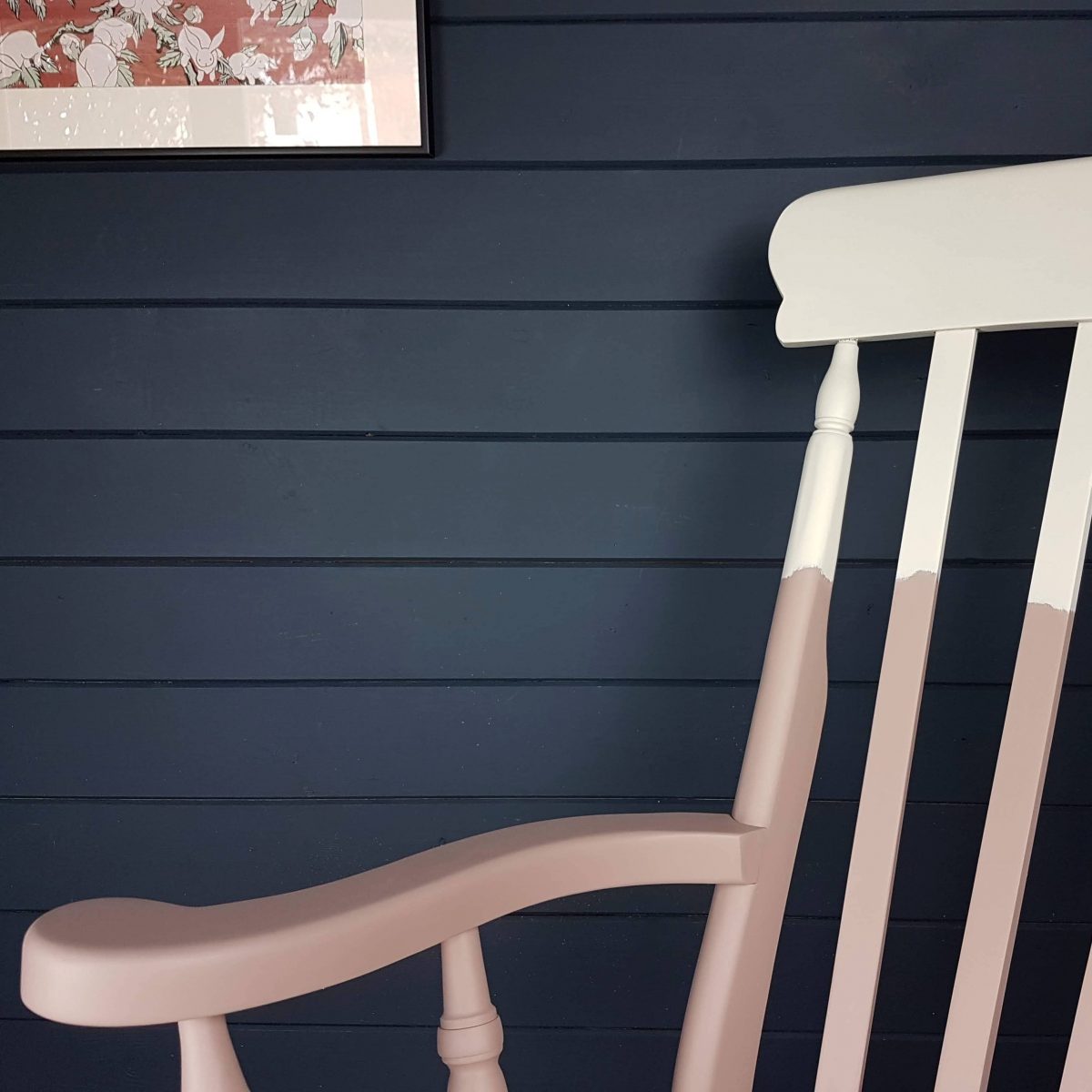 Two-tone pink and white painted wooden rocking chair