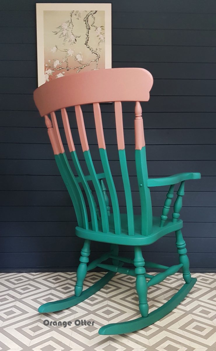 Two-tone teal and pink painted wooden rocking chair