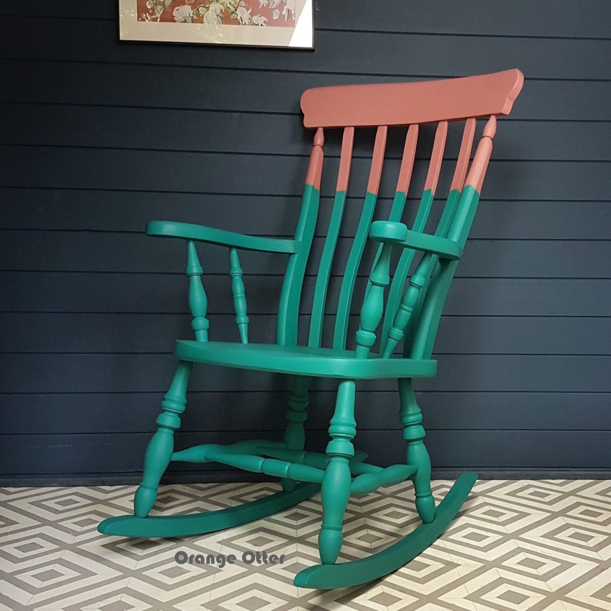 Two-tone teal and pink painted wooden rocking chair