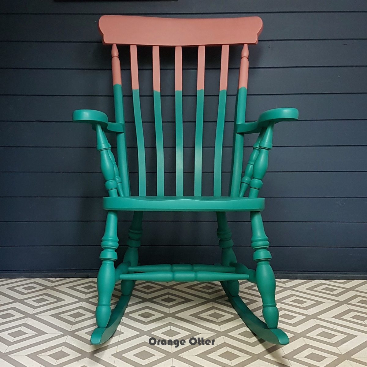 Two-tone teal and pink painted wooden rocking chair