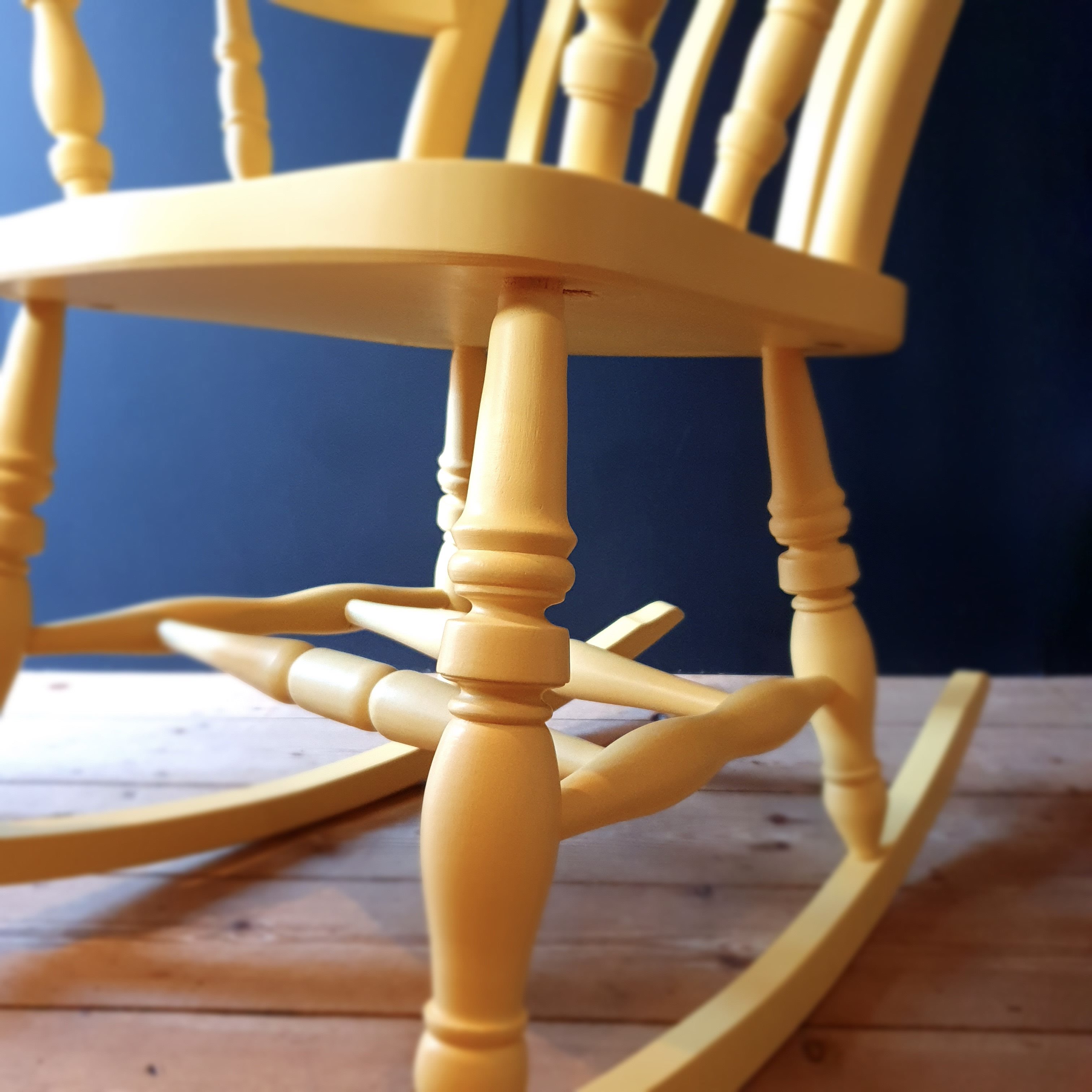 Two-tone yellow and grey painted wooden rocking chair