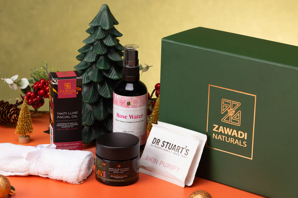 Spoil Her Self Love Gift Box featuring Makeda Glow Pot, Tikiti Luxe facial oil, a bamboo face towel, skin teas and natural skincare treats beautifully arranged in a box