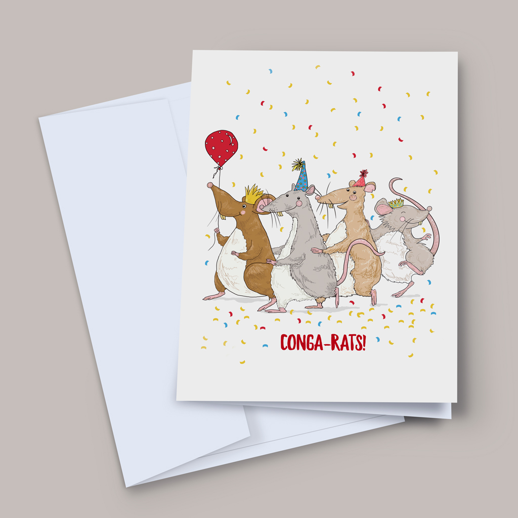 A congratulations greeting card showing four illustrated rats in party hats and gold crowns dancing in a conga line, surrounded by colourful confetti. One rat holds a red polka-dot balloon. Bold red text reads CONGA-RATS! Card shown with a pale white envelope on a warm grey background.