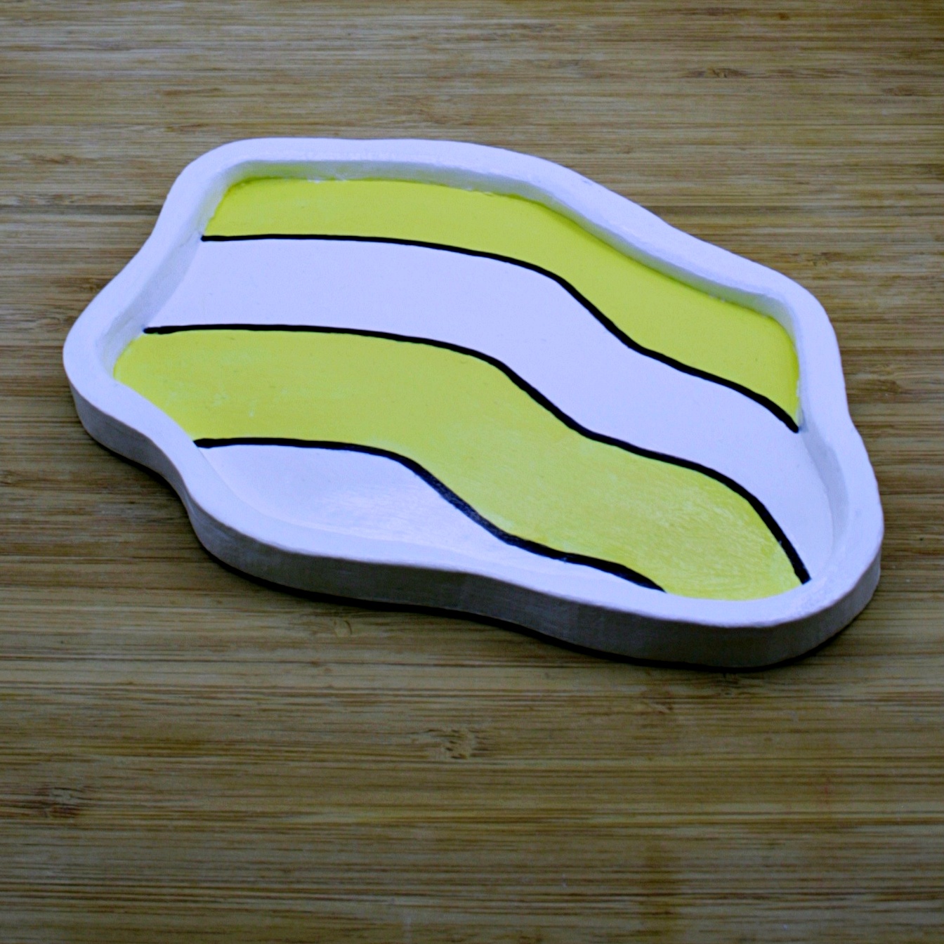 Handmade air-dry clay bee striped tray