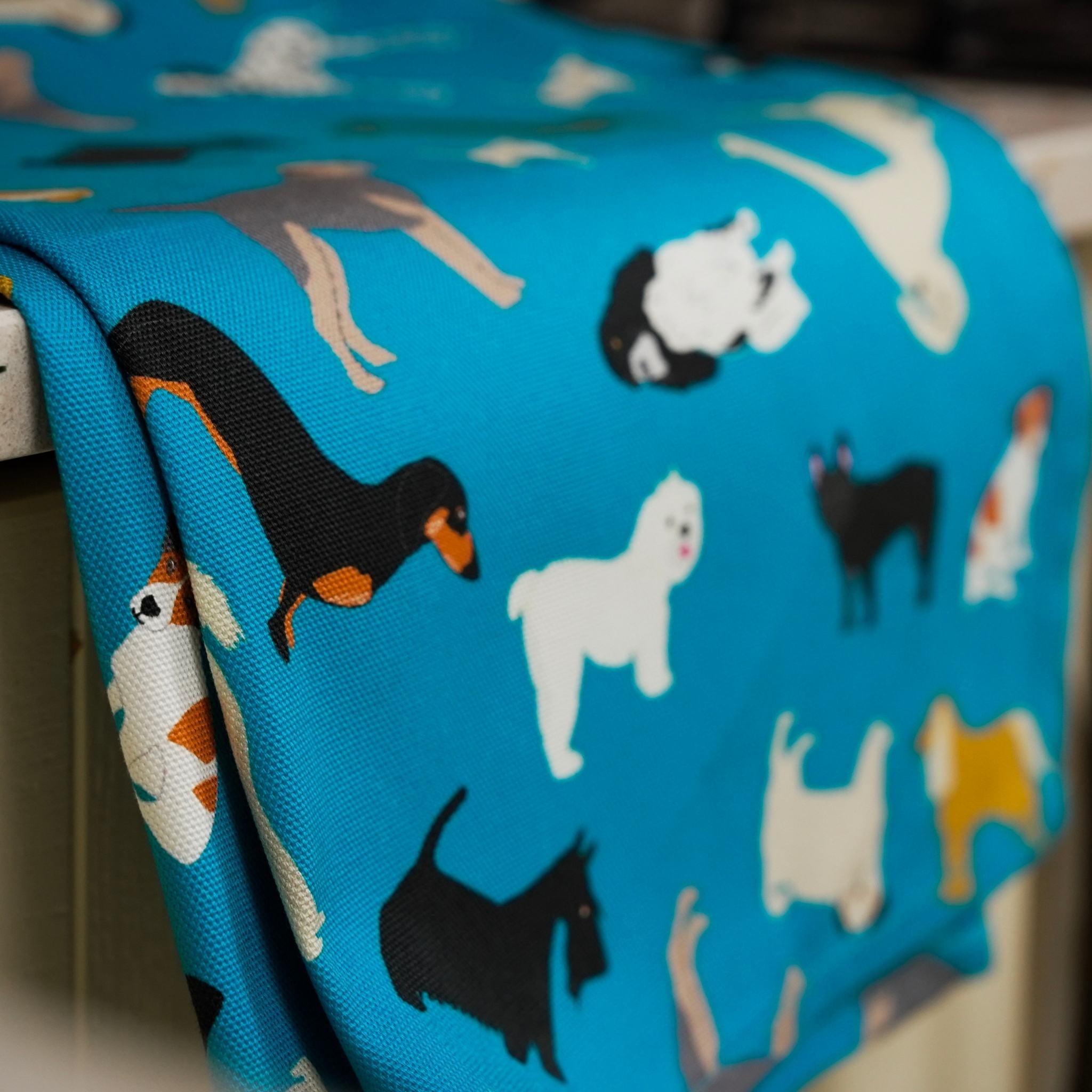 Dogs: New Tricks organic cotton tea towel