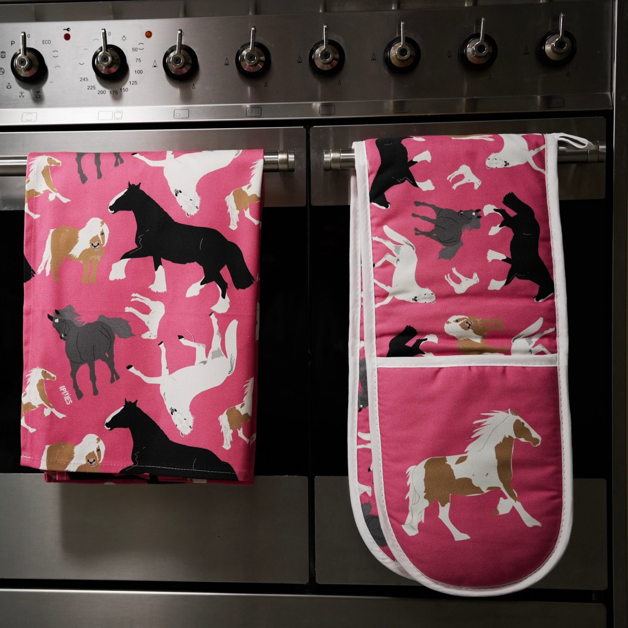 Pink organic cotton teat towel with horses illustrations